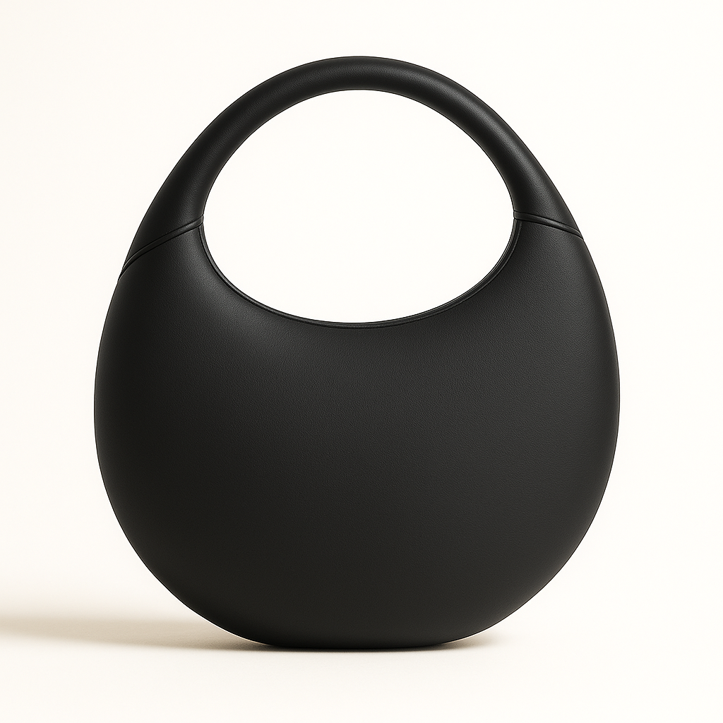 Back view of Sirah, an elegant black leather moon bag, handcrafted in France
